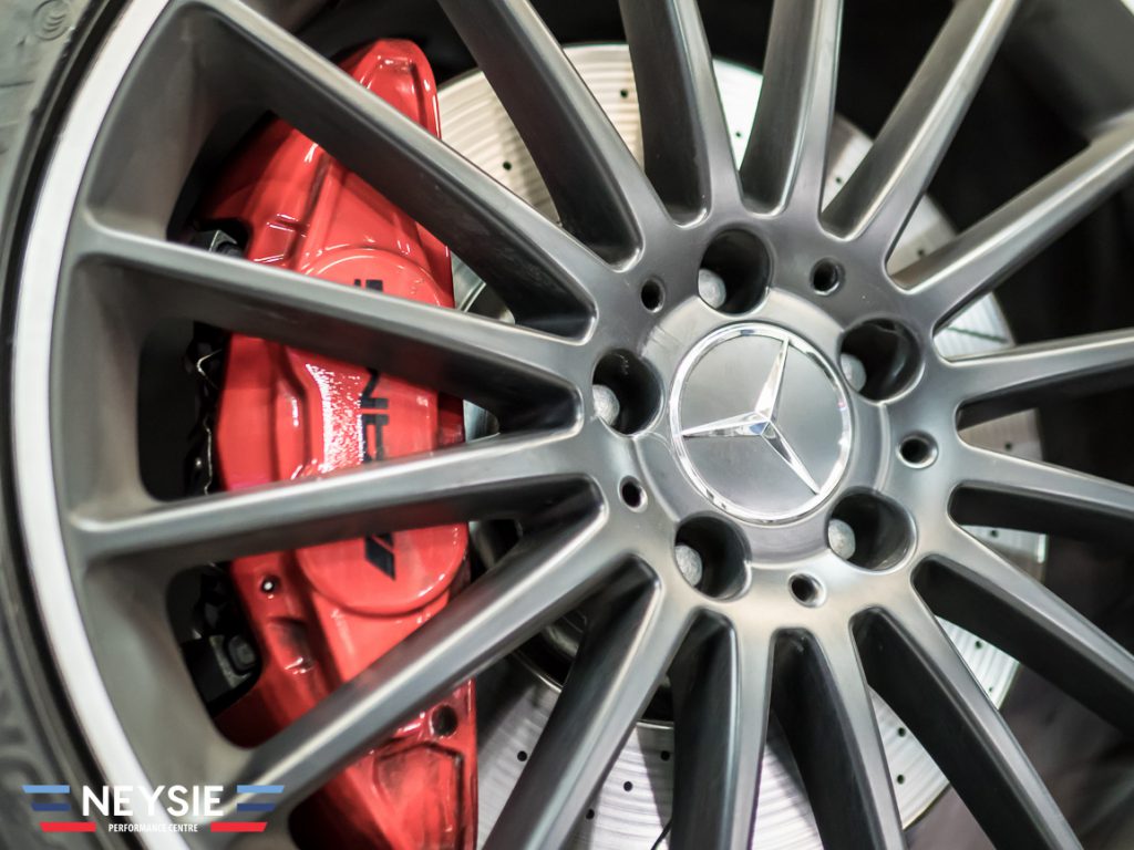Mercedes AMG disc brakes and alloy wheels.